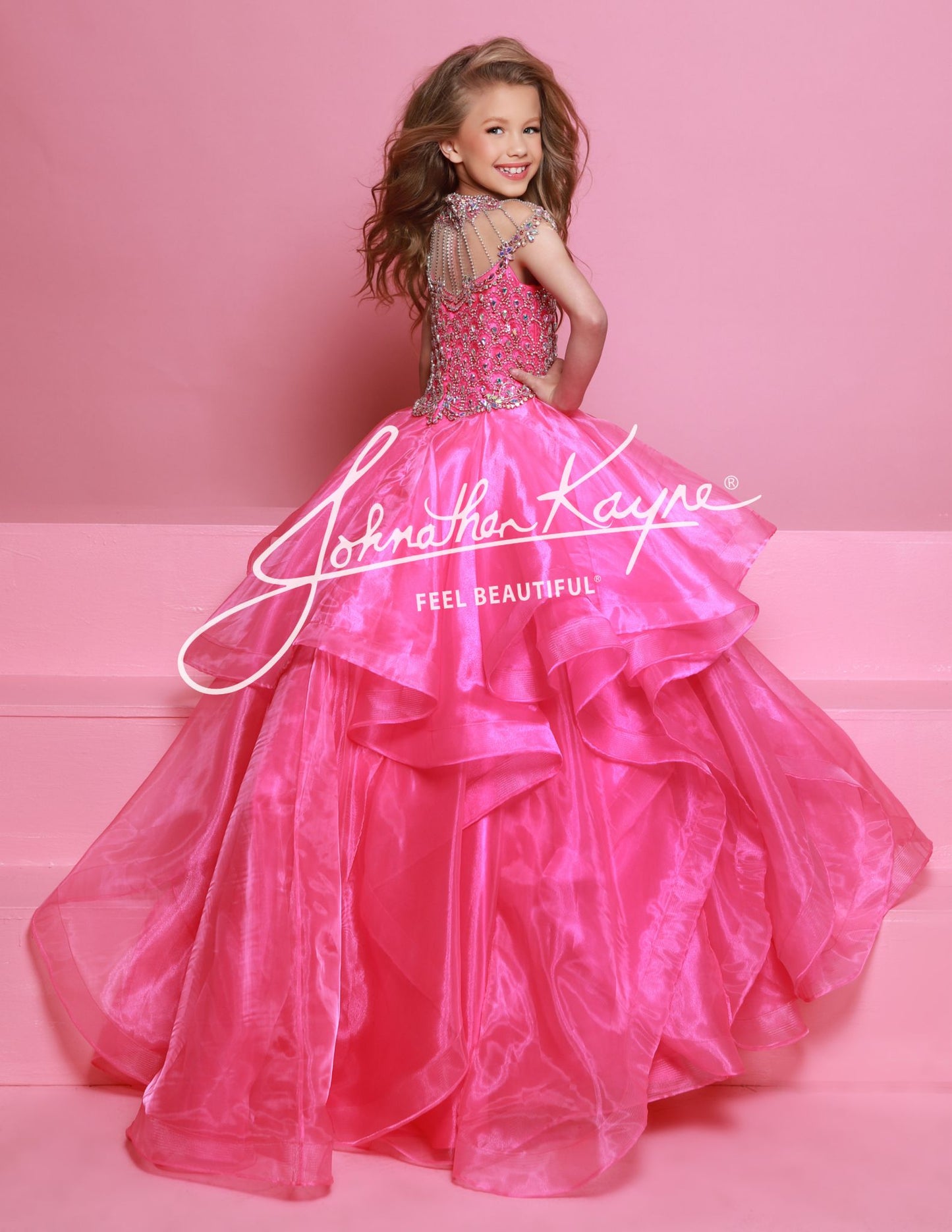 Sugar Kayne C354&nbsp; This high-quality girls' pageant ballgown from Sugar Kayne boasts an embellished bodice, a high crystal neckline, and a layered organza long skirt with horsehair trim. Perfect for making a statement on stage, this dress exudes elegance and sophistication. Walk with confidence and grace in this stunning piece.

Colors:&nbsp; Barbie Pink, Daffodil, Jade, Turquoise

Sizes:&nbsp; 2-16