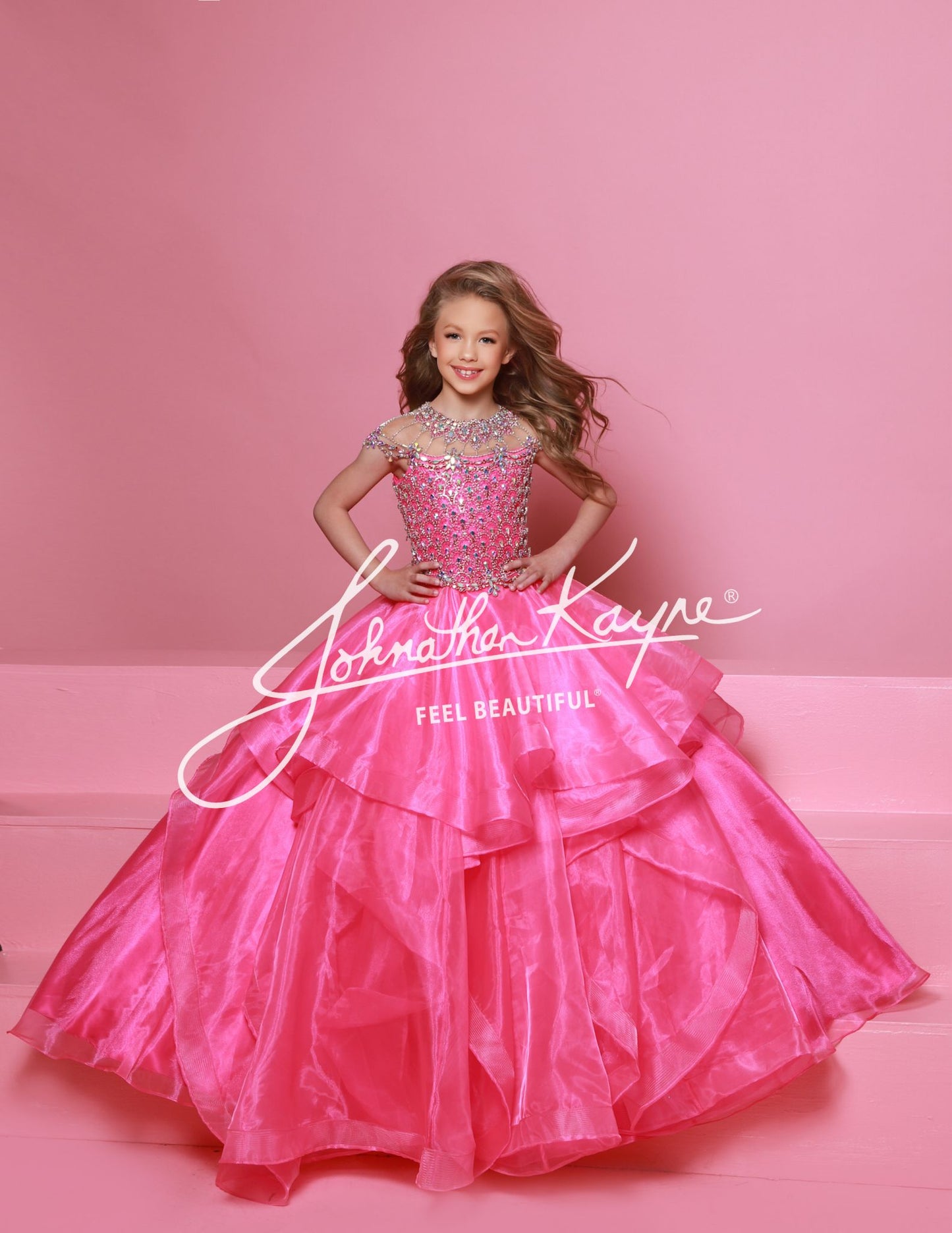 Sugar Kayne C354&nbsp; This high-quality girls' pageant ballgown from Sugar Kayne boasts an embellished bodice, a high crystal neckline, and a layered organza long skirt with horsehair trim. Perfect for making a statement on stage, this dress exudes elegance and sophistication. Walk with confidence and grace in this stunning piece.

Colors:&nbsp; Barbie Pink, Daffodil, Jade, Turquoise

Sizes:&nbsp; 2-16