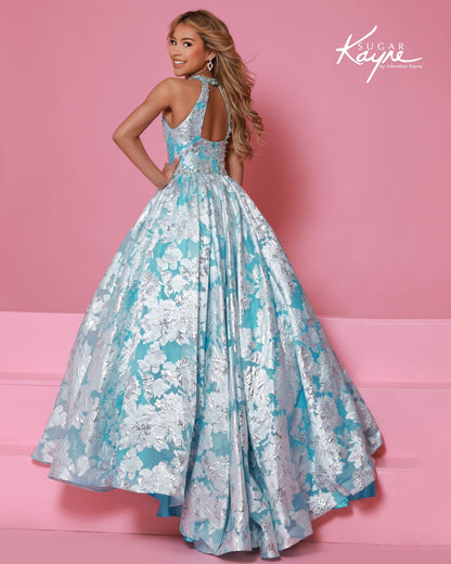Designer: Sugar Kayne — Style C404
Sugar Kayne style C404 is a classic girls pageant dress with layered organza and a smooth satin lining for beautiful volume and shine. The full skirt and refined bodice give this gown timeless pageant appeal, making it ideal for everything from local titles to national stages.

Sizes: 2–16
Colors: Metallic Blue, Metallic Pink