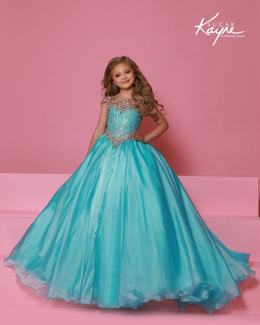 Designer: Sugar Kayne — Style C405
Sugar Kayne style C405 is a classic girls pageant dress with layered organza and a smooth satin lining for beautiful volume and shine. The full skirt and refined bodice give this gown timeless pageant appeal, making it ideal for everything from local titles to national stages.

Sizes: 2–16
Colors: Aqua/Rose Gold, Blush, White/Rose Gold