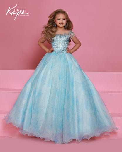 Designer: Sugar Kayne — Style C406
Sugar Kayne style C406 is a classic girls pageant dress with layered organza and a smooth satin lining for beautiful volume and shine. The full skirt and refined bodice give this gown timeless pageant appeal, making it ideal for everything from local titles to national stages.

Sizes: 2–16
Colors: Blush, Blue