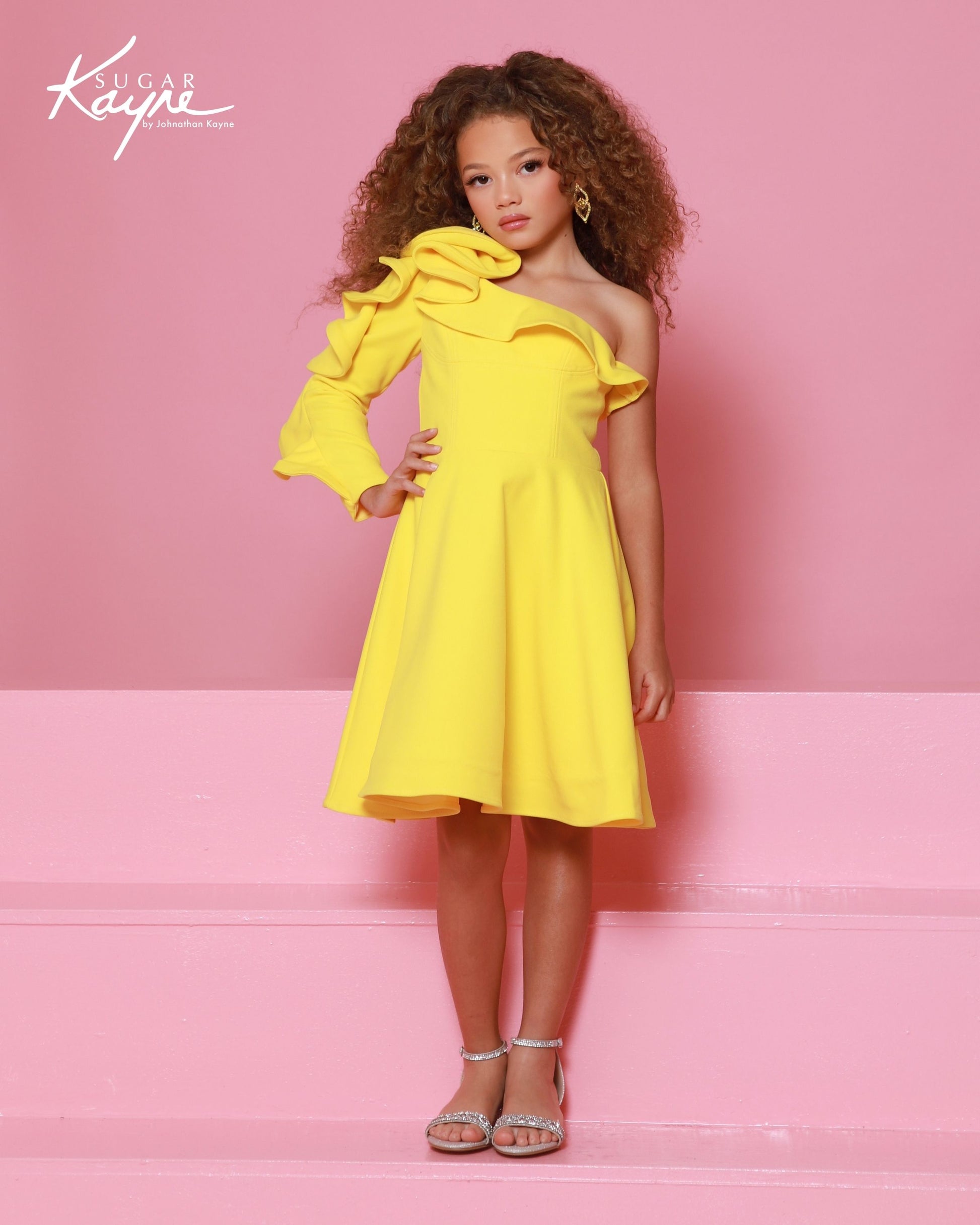 Designer: Sugar Kayne — Style C409
Sugar Kayne style C409 is a versatile girls pageant dress crafted from high-quality special occasion fabrics. Designed for comfort, movement, and standout style, this gown helps her feel confident and camera-ready at every event.

Sizes: 2–16
Colors: Canary, Magenta, Seafoam