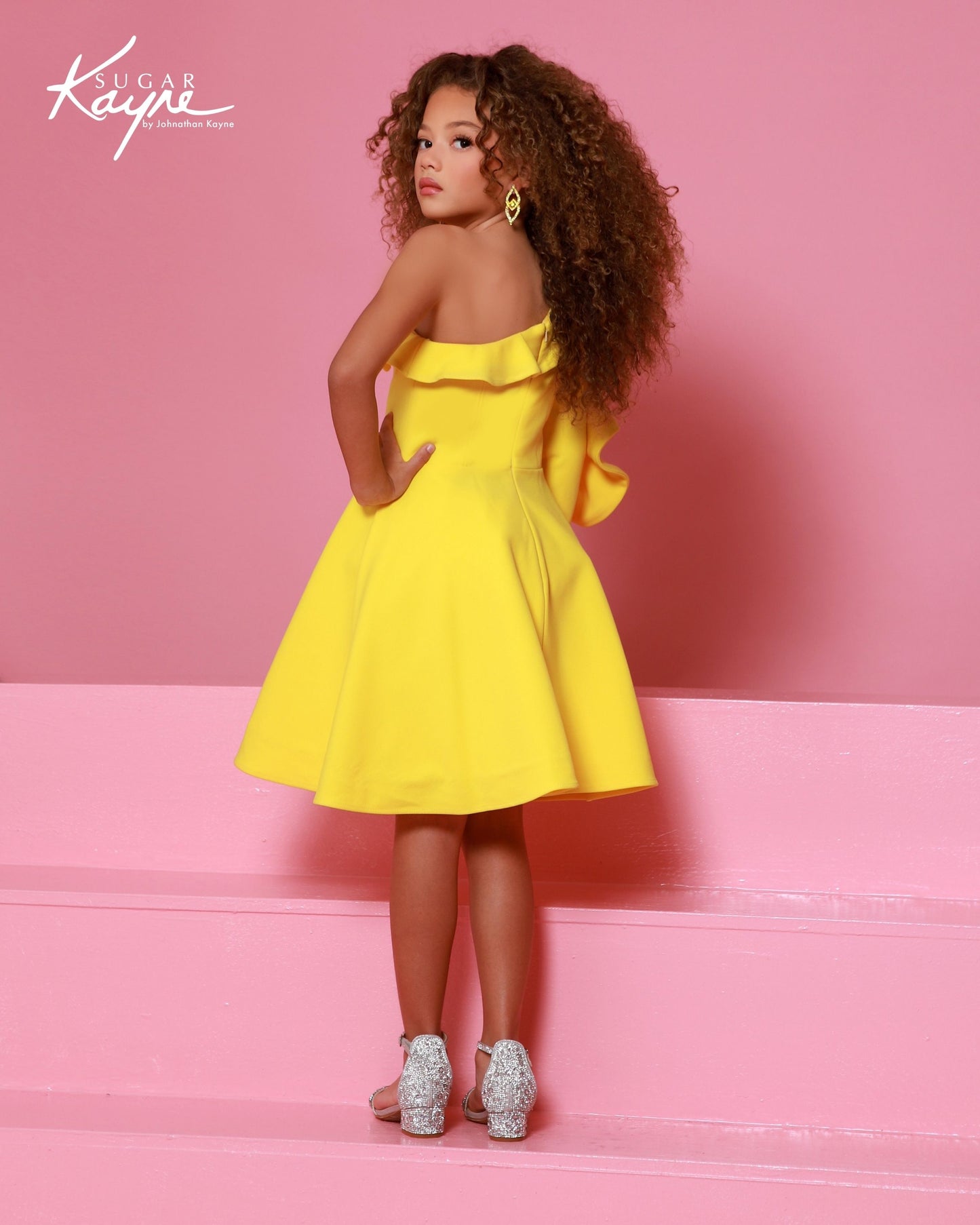 Designer: Sugar Kayne — Style C409
Sugar Kayne style C409 is a versatile girls pageant dress crafted from high-quality special occasion fabrics. Designed for comfort, movement, and standout style, this gown helps her feel confident and camera-ready at every event.

Sizes: 2–16
Colors: Canary, Magenta, Seafoam
