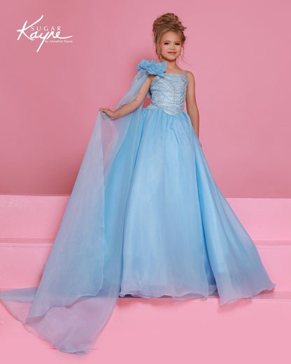 Designer: Sugar Kayne — Style C414
Sugar Kayne style C414 is a classic girls pageant dress with layered organza and a smooth satin lining for beautiful volume and shine. The full skirt and refined bodice give this gown timeless pageant appeal, making it ideal for everything from local titles to national stages.

Sizes: 2–16
Colors: Black/White, Cinderella Blue, Emerald, Petal Pink, White