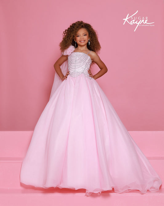 Designer: Sugar Kayne — Style C414
Sugar Kayne style C414 is a classic girls pageant dress with layered organza and a smooth satin lining for beautiful volume and shine. The full skirt and refined bodice give this gown timeless pageant appeal, making it ideal for everything from local titles to national stages.

Sizes: 2–16
Colors: Black/White, Cinderella Blue, Emerald, Petal Pink, White