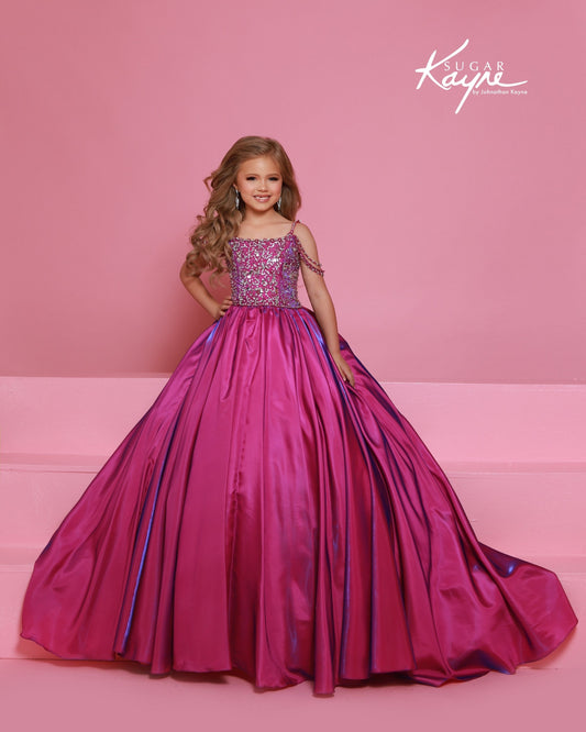 Designer: Sugar Kayne — Style C416
Sugar Kayne style C416 is a versatile girls pageant dress crafted from high-quality special occasion fabrics. Designed for comfort, movement, and standout style, this gown helps her feel confident and camera-ready at every event.

Sizes: 2–16
Colors: Boysenberry, Teal, Soft White