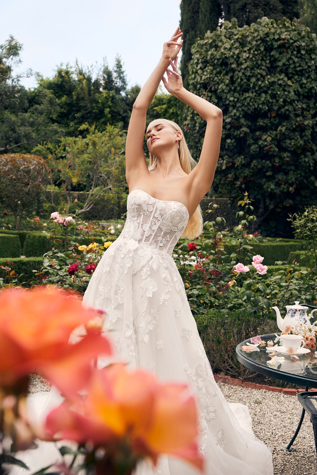Casablanca Bridal 2540 Elloise A-Line Ballgown Strapless Sheer Floral Corset Sweetheart Neckline Open Back Train Wedding Gown. Prepare to be swept away by the ethereal beauty of Style 2540 Elloise, our exquisite A-line wedding dress.