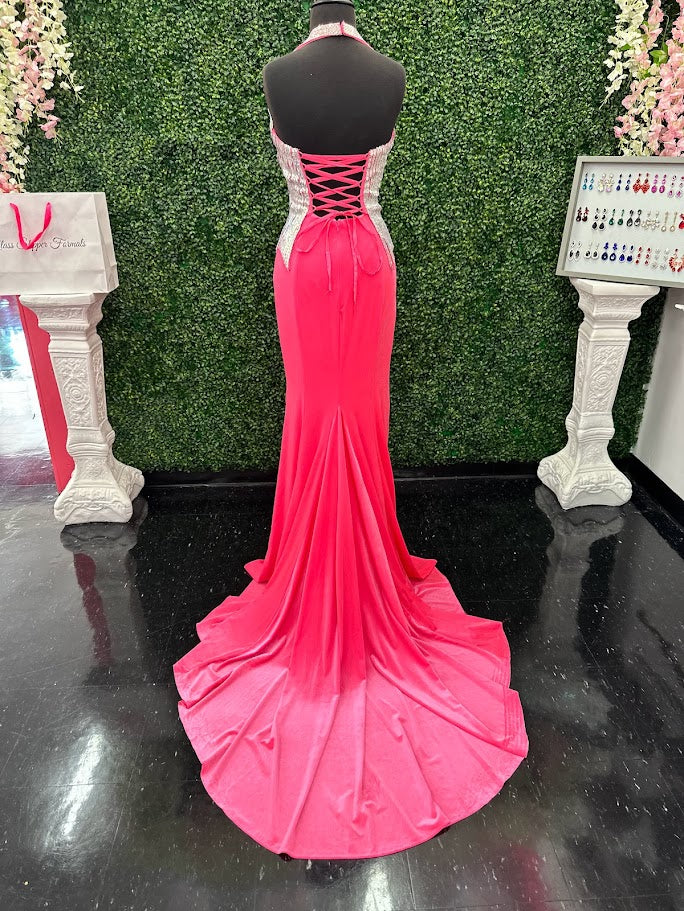 Elevate your formal wardrobe with the Johnathan Kayne 2534 gown, expertly crafted in rich black velvet. This size 4 dress features a crystal-embellished bodice that adds refined sparkle, while the halter corset design offers structured support and a flattering silhouette. The long fitted skirt includes a tasteful slit, combining elegance with a touch of allure—ideal for pageants or upscale events. This gown balances sophistication and glamour, ensuring you make a confident statement at any special occasion.