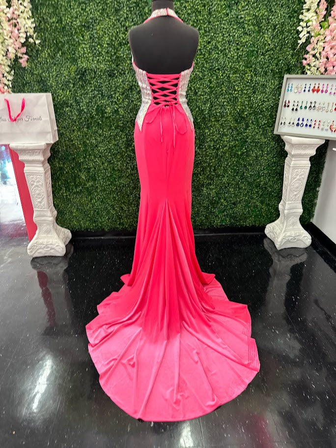 Elevate your formal wardrobe with the Johnathan Kayne 2534 gown, expertly crafted in rich black velvet. This size 4 dress features a crystal-embellished bodice that adds refined sparkle, while the halter corset design offers structured support and a flattering silhouette. The long fitted skirt includes a tasteful slit, combining elegance with a touch of allure—ideal for pageants or upscale events. This gown balances sophistication and glamour, ensuring you make a confident statement at any special occasion.