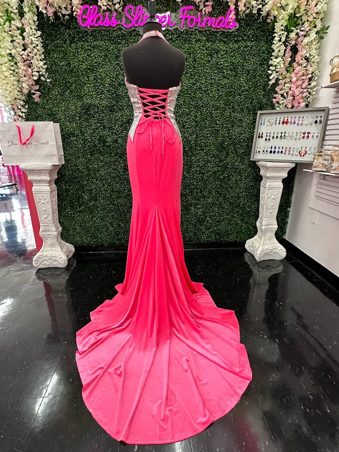 Elevate your formal wardrobe with the Johnathan Kayne 2534 gown, expertly crafted in rich black velvet. This size 4 dress features a crystal-embellished bodice that adds refined sparkle, while the halter corset design offers structured support and a flattering silhouette. The long fitted skirt includes a tasteful slit, combining elegance with a touch of allure—ideal for pageants or upscale events. This gown balances sophistication and glamour, ensuring you make a confident statement at any special occasion.