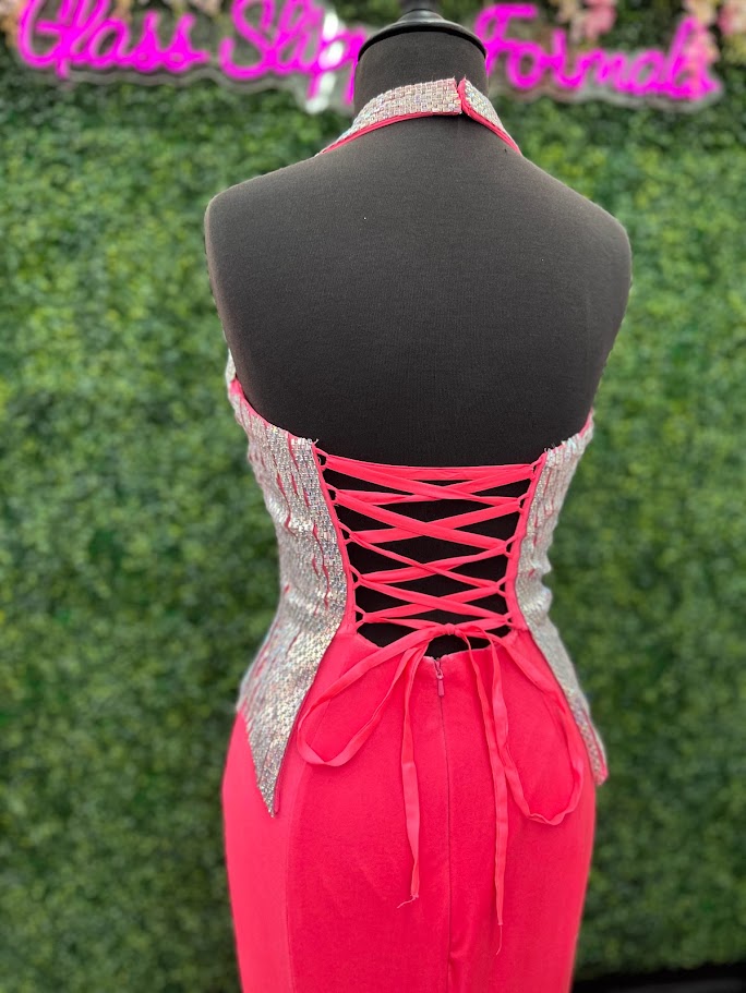 Elevate your formal wardrobe with the Johnathan Kayne 2534 gown, expertly crafted in rich black velvet. This size 4 dress features a crystal-embellished bodice that adds refined sparkle, while the halter corset design offers structured support and a flattering silhouette. The long fitted skirt includes a tasteful slit, combining elegance with a touch of allure—ideal for pageants or upscale events. This gown balances sophistication and glamour, ensuring you make a confident statement at any special occasion.