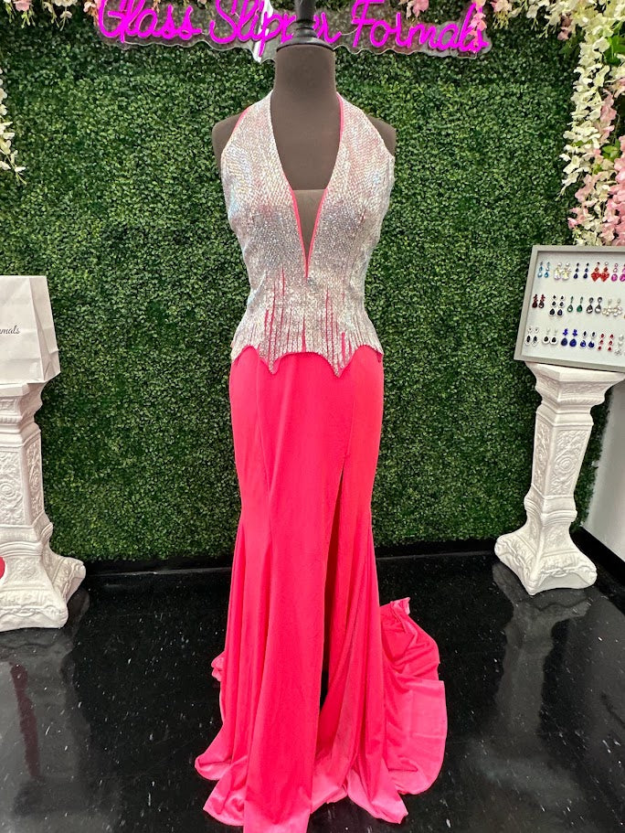 Elevate your formal wardrobe with the Johnathan Kayne 2534 gown, expertly crafted in rich black velvet. This size 4 dress features a crystal-embellished bodice that adds refined sparkle, while the halter corset design offers structured support and a flattering silhouette. The long fitted skirt includes a tasteful slit, combining elegance with a touch of allure—ideal for pageants or upscale events. This gown balances sophistication and glamour, ensuring you make a confident statement at any special occasion.