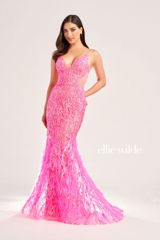 The Ellie Wilde EW35006 Sheer Sequin Prom Dress Gown features a low lace-up back with a side waist mesh inset corset and a glamorous, full-length feather skirt. Look stunning on your special night with this luxurious backless gown.  COLOR: ORANGE, CHAMPAGNE, EMERALD, HOT PINK, IRIS SIZE: 00 - 16