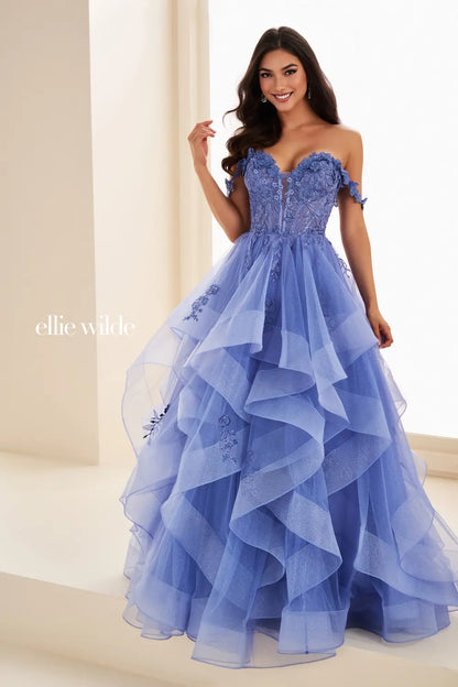 Make a statement in the Ellie Wilde EW35084 prom dress. Featuring an off-the-shoulder top, shimmer sequin lace and ruffle detail, the dress offers a timeless and sophisticated look perfect for the big night. Keep it classic in this classic formal gown.

Sizes: 00-24

Color  Dusk