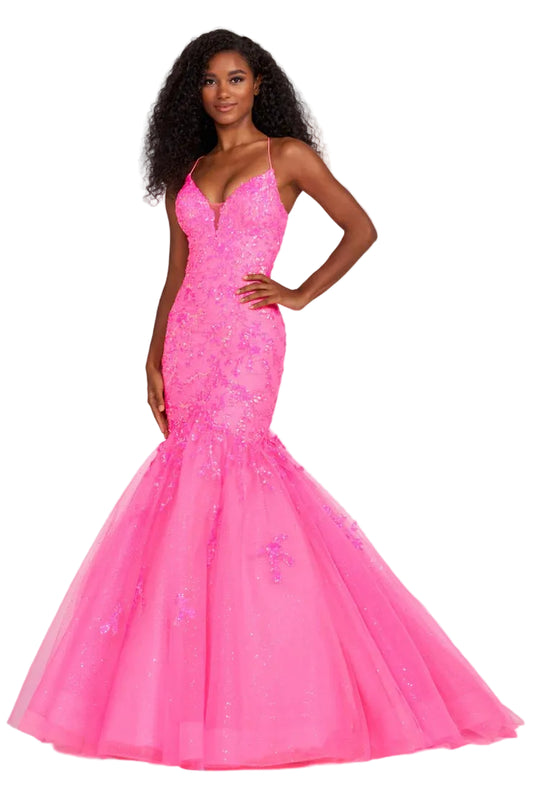 Exude glamour on your special night in the EW34011 Ellie Wilde Sequin Backless Corset Mermaid Prom Dress. This luxurious dress features an intricate sequin bodice, corset back closure, and shimmer formal trumpet skirt. The plunging V neckline is sure to have all eyes on you as you make your grand entrance.  Sizes: 00-16  Colors: ORANGE, PERIWINKLE, EMERALD, HOT PINK