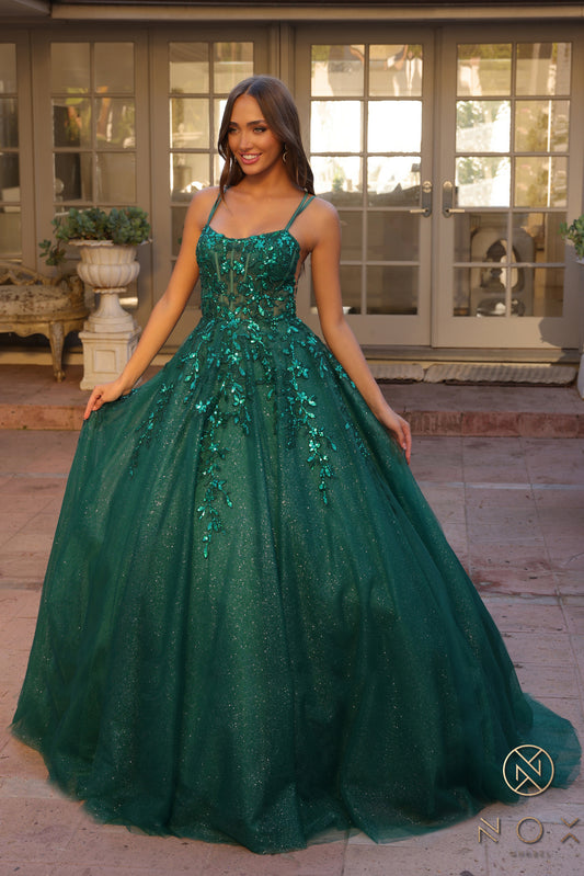 Elevate your prom night look with the Nox Anabel H1271 dress. This elegant A-line gown features a stunning shimmering tulle design with a sheer sequin corset and a flattering scoop neck. Perfect for making a statement with a touch of glamour.  Sizes: 00-16  Colors: Green, Fuchsia, Lavender