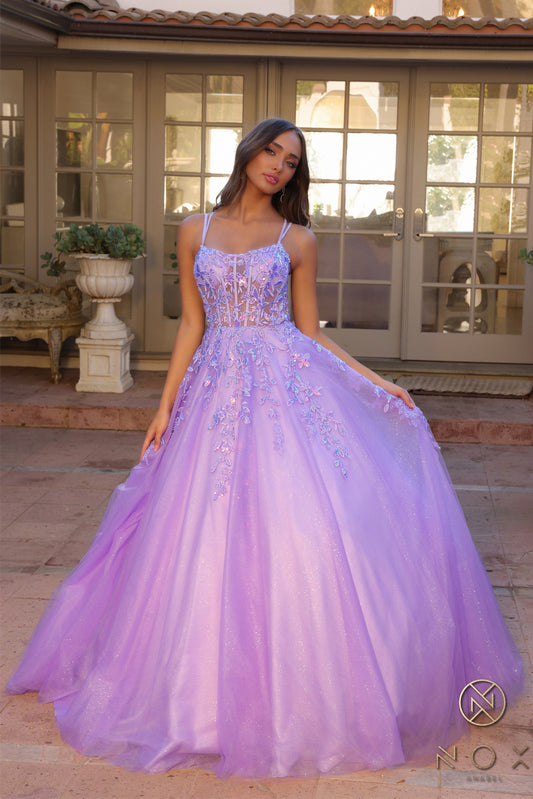 Elevate your prom night look with the Nox Anabel H1271 dress. This elegant A-line gown features a stunning shimmering tulle design with a sheer sequin corset and a flattering scoop neck. Perfect for making a statement with a touch of glamour.  Sizes: 00-16  Colors: Green, Fuchsia, Lavender