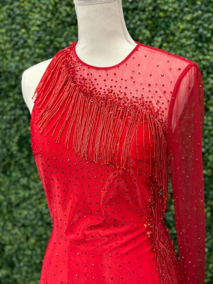 The Johnathan Kayne 2795 Size 4 Crystal Sheer Beaded Fringe Long Sleeve Cocktail Dress is crafted from Satin shimmer fabric and features a sheer beaded fringe design. one long sleeve with fringe and crystal accents. This sophisticated take on a classic dress is sure to delight with its delicate elegance. Asymmetrical skirt.  * ONE OF A KIND  Size: 4  Color: Red