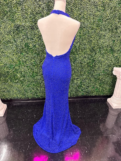 Johnathan Kayne 2728 is a size 4 cowl neck formal gown crafted with Custom Liquid Beading. The halter neck closure makes for a beautiful and stylish silhouette with a royal finish. Perfect for your next event!   ** One of a kind Custom  Size: 4  Color: Royal