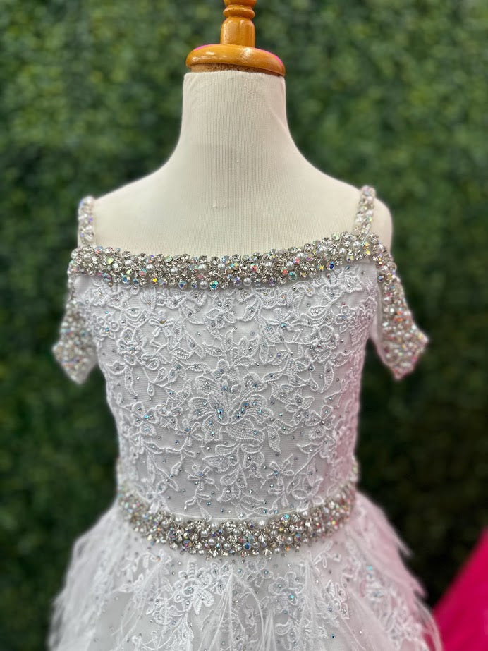 This stunning Ashley Lauren Kids 8242 ballgown is crafted with beautiful white feather lace and features an off-the-shoulder cut. The crystal bodice brings a romantic and princess-like feel to this pageant dress. Perfect for your little one special day.  Size: 4  Color: White