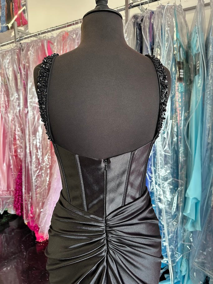 Elevate your formal occasion with the Nina Canacci 3271, a size 0 long fitted satin prom dress designed for a flawless silhouette. This elegant gown features a structured corset that enhances your shape, complemented by a daring slit for graceful movement. Intricate beading adds a touch of sophistication, making it perfect for evening events where style and refinement are paramount. Crafted to combine comfort with high fashion, this dress ensures you stand out with timeless elegance.

Size: 4

Color: Black