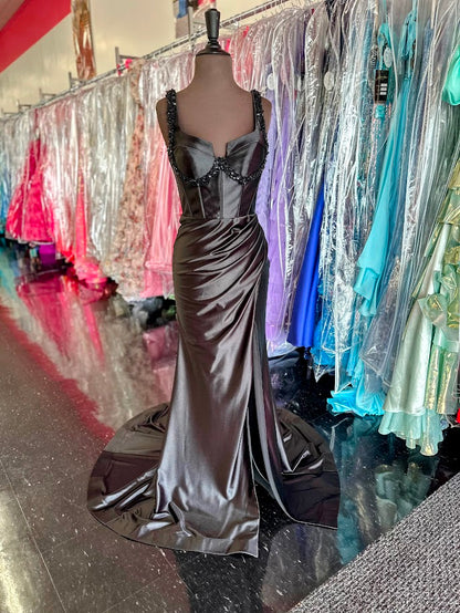 Elevate your formal occasion with the Nina Canacci 3271, a size 0 long fitted satin prom dress designed for a flawless silhouette. This elegant gown features a structured corset that enhances your shape, complemented by a daring slit for graceful movement. Intricate beading adds a touch of sophistication, making it perfect for evening events where style and refinement are paramount. Crafted to combine comfort with high fashion, this dress ensures you stand out with timeless elegance.

Size: 4

Color: Black