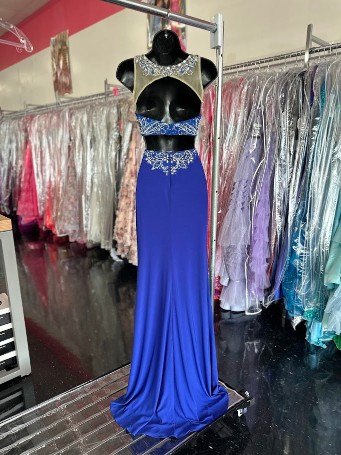 Envious Couture 16089 two piece straight gown with slit.&nbsp;Prom Dress Pageant Gown&nbsp;Two Piece Formal Pageant Dress Sheer Neckline Slit

Size: 0

Color: Royal