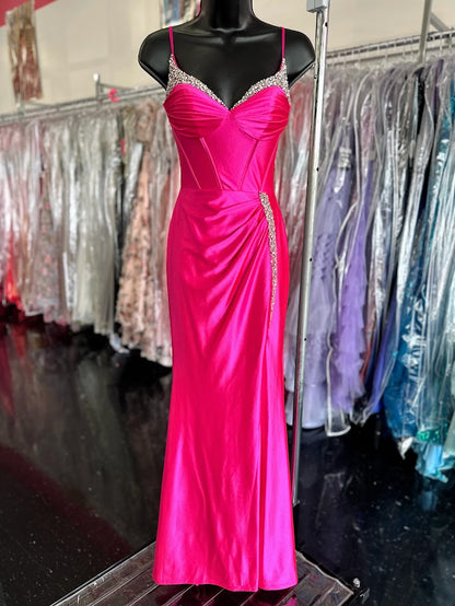 Expertly crafted with a flattering corset bodice and a sparkling crystal V-neckline, the Candice Wang 72345 Prom Dress exudes elegance and sophistication. Made from high-quality satin, this dress is both comfortable and luxurious. The figure-hugging design, with a sexy thigh-high slit, is perfect for any formal event.

Sizes: 0, 12

Colors: Hot Pink