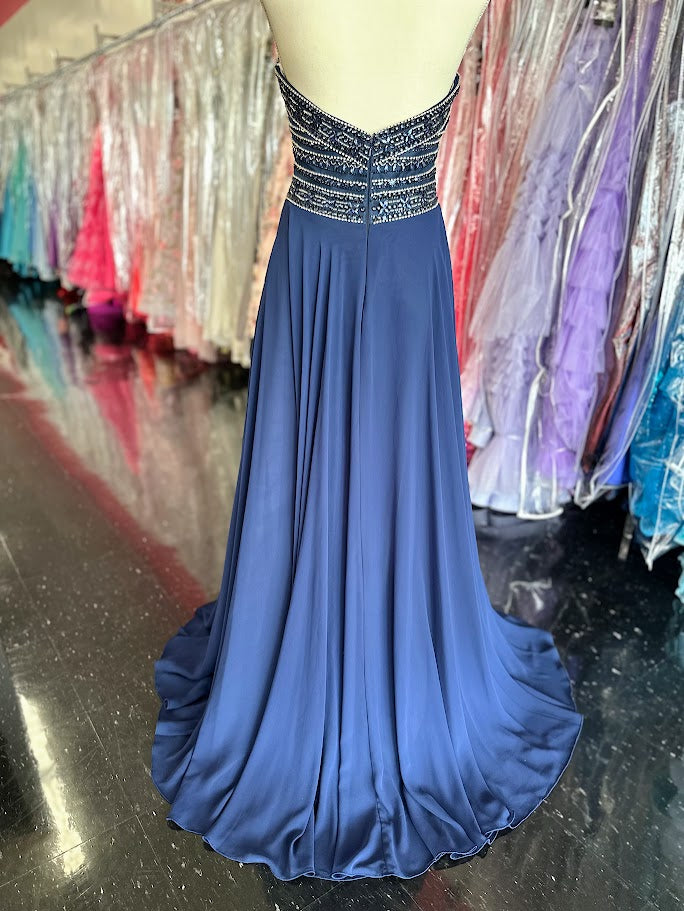 Envious Couture E1467 by Karishma Creations is a long Prom, Pageant &amp; Bridal Dress. Featuring a strapless sweetheart neckline with a Crystal embellished bodice and a flowing chiffon high waist skirt. Slit in the side skirt.

Size 8 Navy
