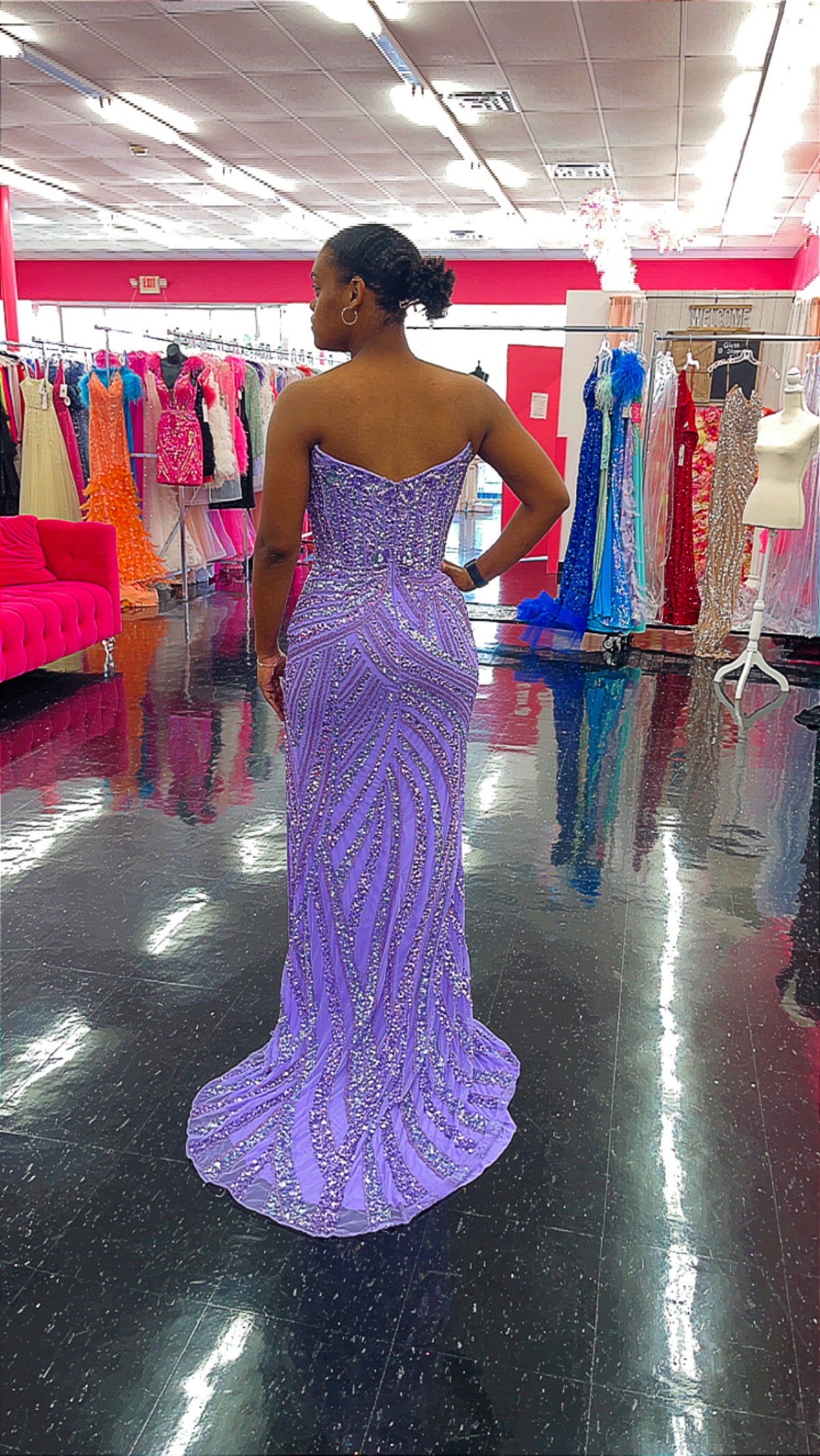 Ashley Lauren 11236 Long Fitted V Neck Slit Beaded Sequin Prom Dress Pageant Gown This strapless gown is sure to turn heads. The sweetheart neckline is complete with a modern floral sequin motif that continues down the bustier and skirt. The skirt is complete with a left leg slit. Strapless Bustier Left Leg Slit Fully Hand Beaded Colors:  Lilac Sizes: 10, 12, 14