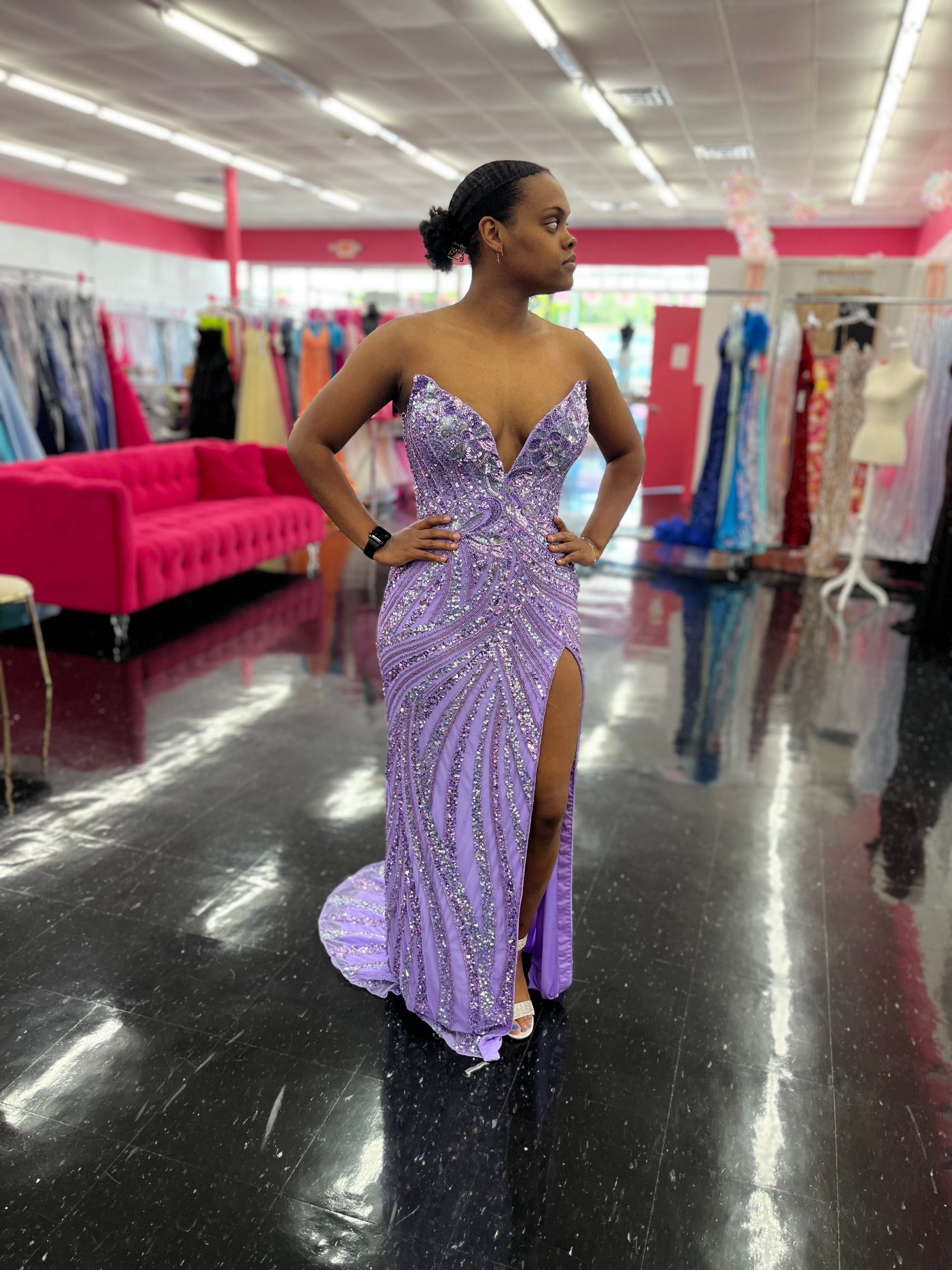 Ashley Lauren 11236 Long Fitted V Neck Slit Beaded Sequin Prom Dress Pageant Gown This strapless gown is sure to turn heads. The sweetheart neckline is complete with a modern floral sequin motif that continues down the bustier and skirt. The skirt is complete with a left leg slit. Strapless Bustier Left Leg Slit Fully Hand Beaded Colors:  Lilac Sizes: 10, 12, 14
