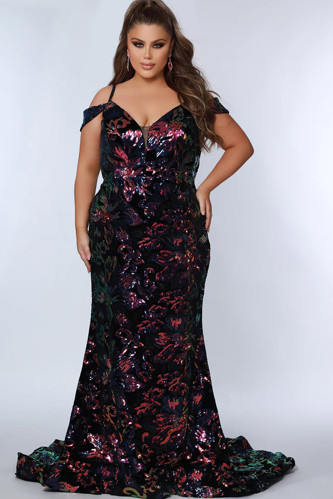 Johnathan Kane For Sydney's Closet JK2302 Slim Fitted Ombre Sequins On Velvet V-Neck Modified Basque Waistline Detachable Drape Sleeves Plus Size Prom Dress.  Elevate your special event look with this stunning plus size dress from Johnathan Kane. Crafted from soft velvet and featuring ombre sequins, it has a slim fit, V-neckline, modified Basque waistline, and detachable drape sleeves. Feel glamorous with this slim silhouette and dazzle in the ombre sequins.
