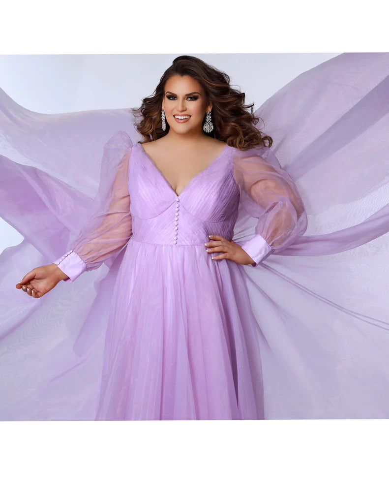 Johnathan Kane For Sydney's Closet JK2317 V-Neck Pleated Bodice Long Sheer Pouf Sleeve With Cuff Train Plus Size Formal Dress. Johnathan Kane's JK2317 plus size formal dress features a pleated bodice, sheer pouf sleeves with a cuff train, and a V-neck cut for a timeless silhouette. Perfect for special occasions, this gorgeous dress is sure to make a statement.