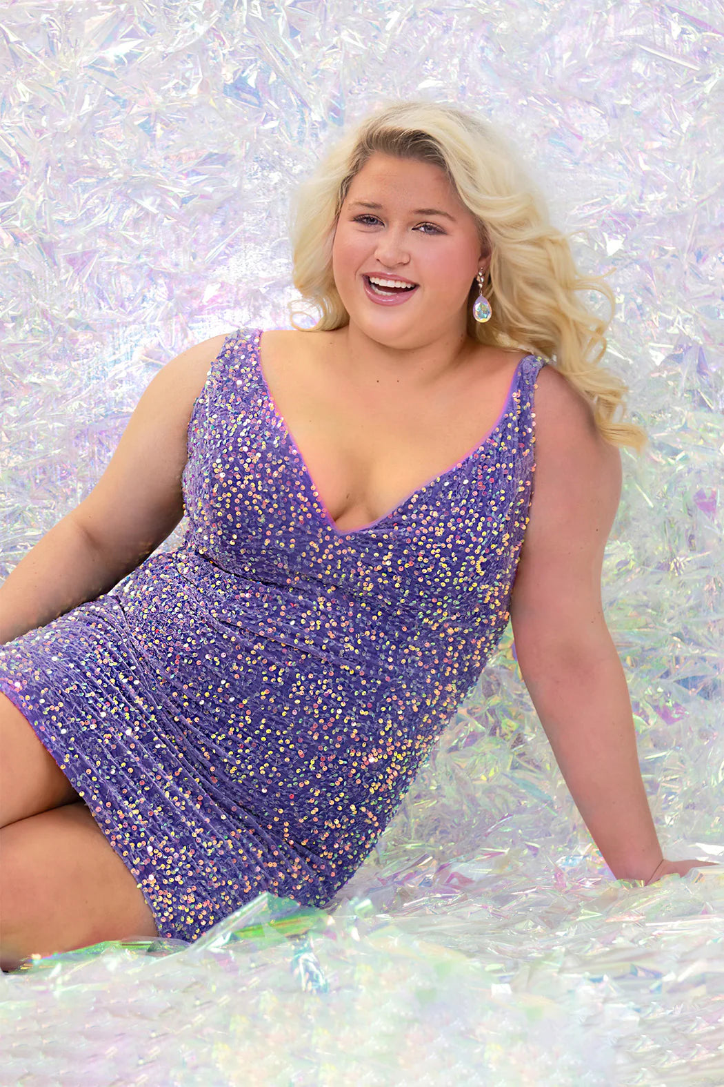 A perfect addition to any wardrobe, the Sydneys Closet JK2402 Velvet Sequin Plus Size Cocktail Dress is a gorgeous V Neck Formal Gown in a stunning sequin design. Cut with a sleek silhouette, this dress is sure to make a statement.Homecoming will be a sensation when you rock the stunning Sequin Secret Party cocktail dress! 