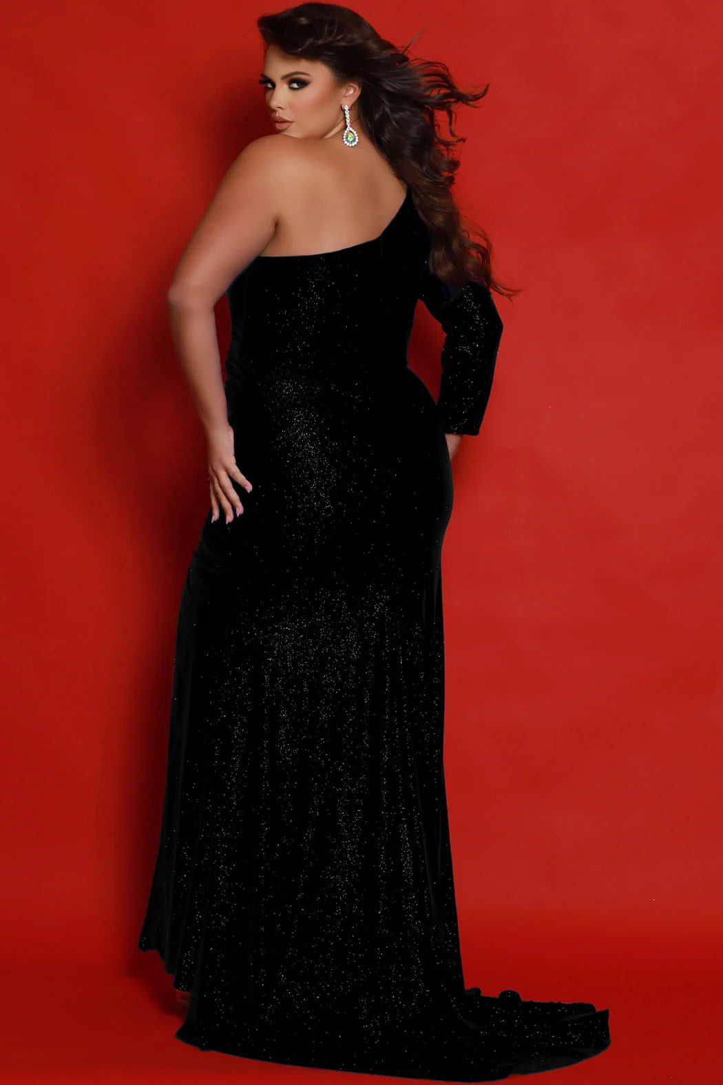 The Sydneys Closet JK2410 Dress features an off-shoulder design with a dramatic slit and fringe details. Ruched for an elegant fit, this shimmer jersey dress will make a statement on any pageant stage. Plus size available. Unleash your inner diva at Prom 2024 or any formal event in this sleek, curve-hugging plus size evening gown packed with glamourous design details. The Beamer fitted formal dress sparkles in shimmering stretch Lycra that hugs your curves in all the right places.