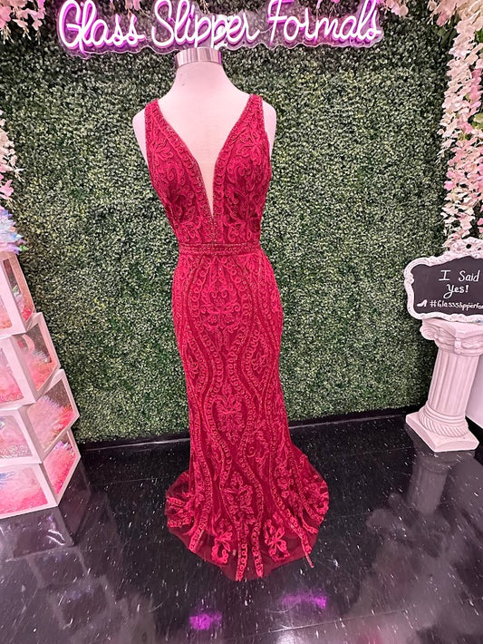 Jovani JVN03112 Is a long fitted prom dress, Pageant Gown &amp; Evening Formal Wear. Featuring a Deep Plunging V Neckline with a mesh insert. Embellished Bodice Gives a Classic look. This evening gown would make a great mother of the bride or groom dress or wedding guest dress. 03112

Available Colors:&nbsp;burgundy

Available Sizes:&nbsp;10 (In Stock)

Closure:&nbsp;Invisible Back Zipper with Hook and Eye Closure.
&nbsp;
Details:&nbsp;Embroidered crystal embellished prom dress, form fitting silhouette, flo