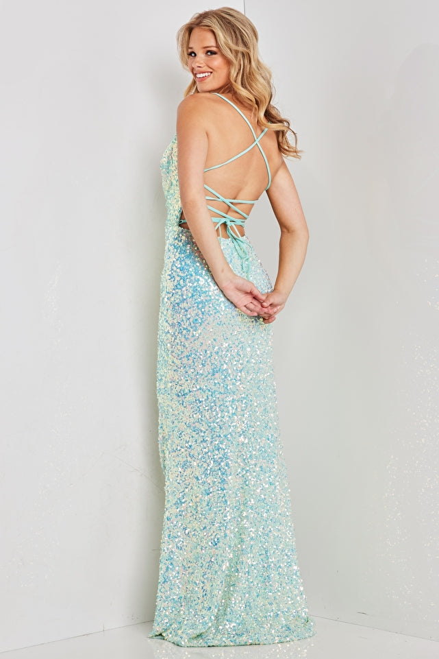 Be the star of the night in this Jovani JVN38470 prom dress. Its stunning backless corset design, exquisite sequin detailing, and elegant cowl neck will surely turn heads. Perfect for formal events, this dress also features a daring slit for added allure. Stand out from the crowd in this captivating evening gown.  Sizes: 00-24  Colors: Aqua, Gold, Lilac, Neon Pink, Platinum