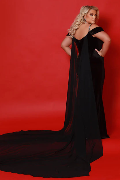 This Sydneys Closet JK2514 Ferrari Velvet Crystal Corset Dress is a luxurious option for formal events. The off-the-shoulder design and slit add an elegant touch, while the crystal embellishments and velvet fabric provide a glamorous look. The corset construction offers a flattering fit for plus-size figures. Complete the ensemble with the detachable cape for a dramatic effect. Detachable Chiffon Cape.

Size: 22

Color: Onyx