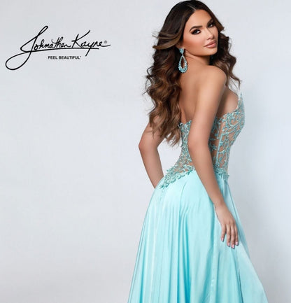 Johnathan Kayne Dress 2554 This pageant gown has a sheer embellished lace bodice with an asymmetrical waistline and peaks for the v neckline. The long charmeuse skirt is layered and has a very long train.  It has detachable off the shoulder straps if you wish.  Prom, Pageant and Evening Dresses  