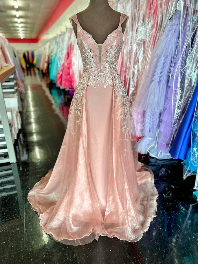 Elevate your formal occasion with the Johnathan Kayne 2226 dress, a size 4 mauve gown designed for elegance and grace. This fitted silhouette features an exquisite embellished lace overlay and a flowing overskirt, creating a refined look perfect for mothers of the bride or pageant events. The delicate details and flattering cut combine to offer timeless sophistication and confidence at any special event.

Size: 4

Color: Mauve