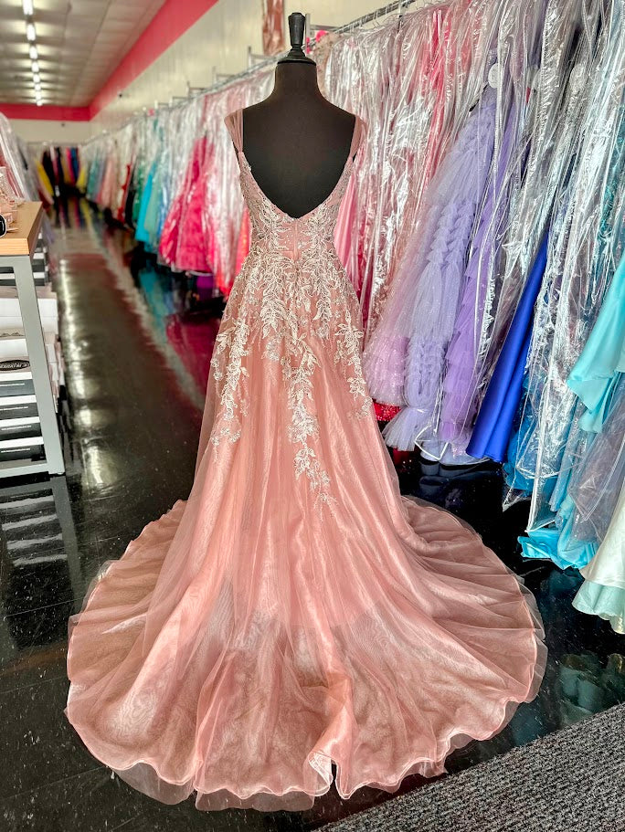 Elevate your formal occasion with the Johnathan Kayne 2226 dress, a size 4 mauve gown designed for elegance and grace. This fitted silhouette features an exquisite embellished lace overlay and a flowing overskirt, creating a refined look perfect for mothers of the bride or pageant events. The delicate details and flattering cut combine to offer timeless sophistication and confidence at any special event.

Size: 4

Color: Mauve