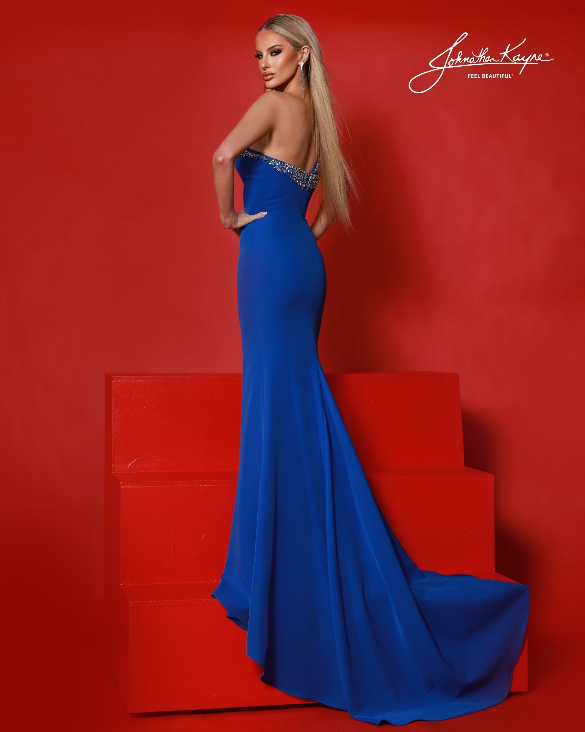 Designer: Johnathan Kayne — Style 3257
Johnathan Kayne style 3257 is a sleek long prom dress in a smooth, structured fabric that highlights the natural shape of the body. The clean lines and refined details make this gown a versatile choice for prom, pageant, and evening occasions that call for a polished, modern gown.

Sizes: 000, 00, 0, 2, 4, 6, 8, 10, 12, 14, 16
Colors: Black, Royal, White