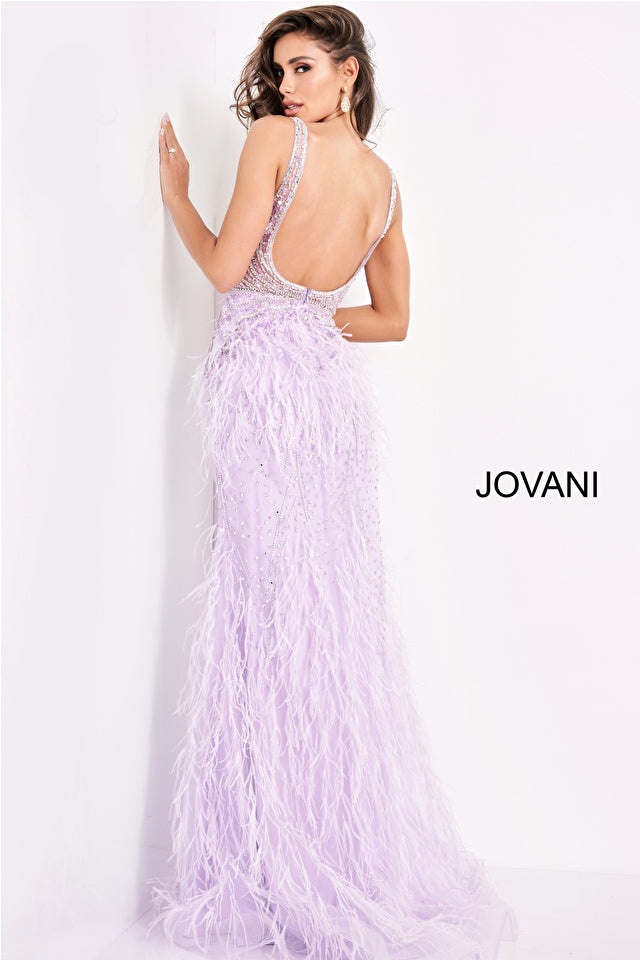 Jovani 03023 is a Long Feather Skirt Prom Dress, Pageant Gown, Wedding Dress & Formal Evening wear. This Sheer embellished bodice features a plunging v neckline with beading & crystal accents cascading through a feather embellished skirt. Very stunning and unique wedding dress!