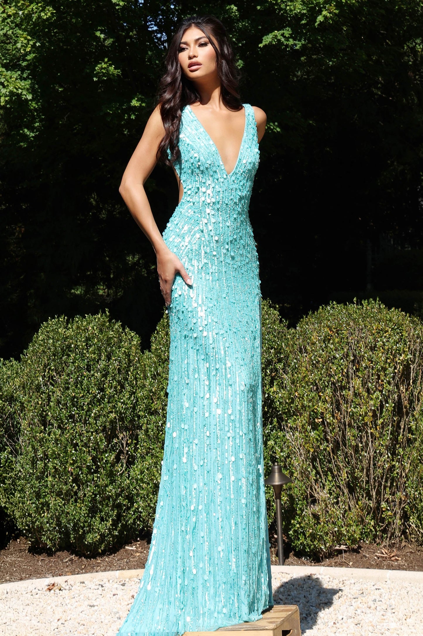 Jovani 43623 Backless Beaded Prom Dress V Neckline Tight Fitted Sequins Slit&nbsp;

Step into elegance with this stunning gown featuring a plunging neckline and sleeveless design. The fitted silhouette beautifully complements the high slit, adding a touch of allure. Intricate sequins adorn the entire dress, creating a mesmerizing shimmer. The open back enhances the sophisticated look, making this floor-length dress a masterpiece for any glamorous event.

Size: 00-14

Colors: Aqua, Red, Teal, Black/Gold, Whi