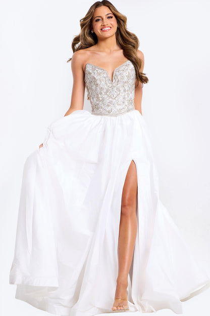 Elevate your pageant or prom look with the Jovani 49247, a stunning beaded ballgown designed to turn heads. This A-line silhouette features a crystal-embellished V-neck bodice with strapless construction for a sophisticated, glamorous appearance. The maxi length with dramatic slit provides elegant movement and floor-sweeping drama. Perfect for pageants, proms, and formal events where you want to make an unforgettable impression.

Sizes: 00-14

Colors: Fuchsia, Royal, White, Silver