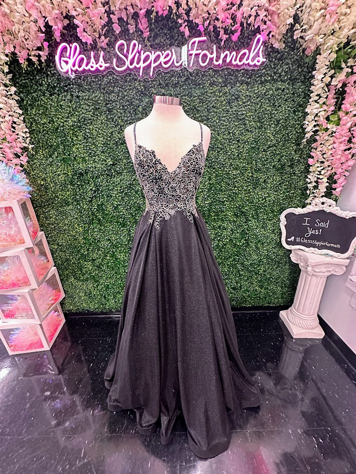 JVN by Jovani 2206 is a Magical Iridescent Ball gown with pockets &amp; a sheer embellished lace bodice prom dress evening gown.&nbsp; &nbsp;JVN2206&nbsp;

Available Size: 10

Available Color: Black