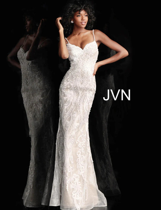 Jovni JVN65529A&nbsp;Ivory and nude embellished and embroidered prom dress with a v-neckline, spaghetti straps, sleeveless fitted bodice and straight back, floor-length fitted skirt with sheer overlay. Evening gown informal wedding dress. JVN 65529

Available Sizes: 10

Available Colors: Ivory/Nude

Closure:&nbsp;Invisible Back Zipper. Hook and Eye Closure.
&nbsp;
Details:&nbsp;Ivory and nude embellished and embroidered prom dress with a v-neckline, spaghetti straps, sleeveless fitted bodice and straight ba
