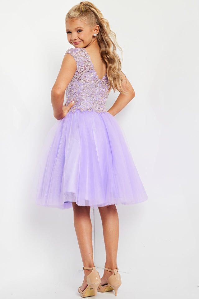 Jovani Kids K04711 Jovani K04711 V-Neck Fit and Flare Embellished Bodice Kids Short Dress. The Jovani K04711 dress is sure to make your little one shine! Not only is this dainty delight fit and flare style with an embellished bodice, but its V-neckline adds an extra touch of elegance to the proceedings. Your star can strut her stuff with confidence knowing she looks fabulous from every angle!
