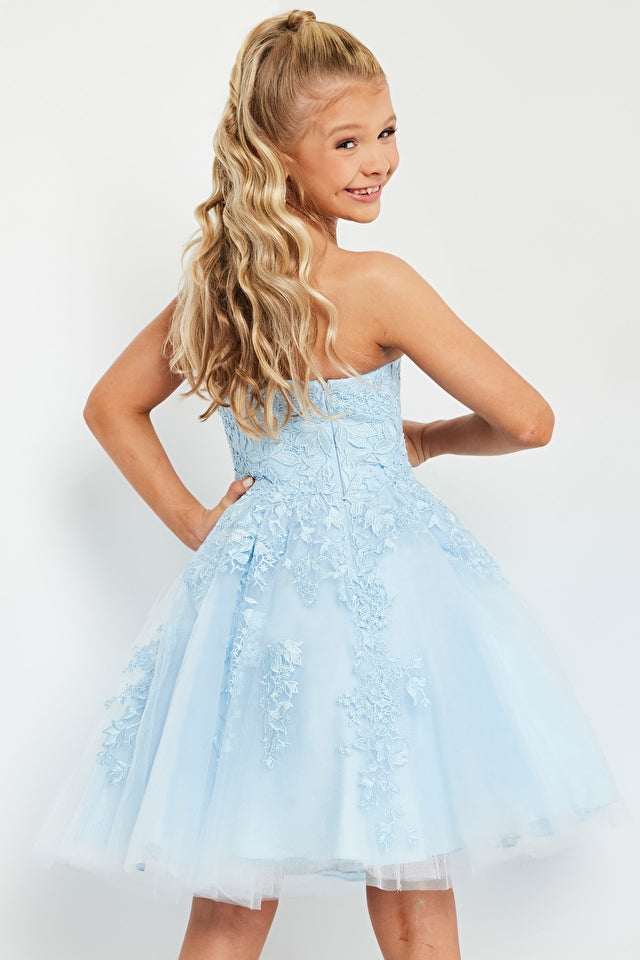 Jovani Kids K1830 Fit And Flare Floral Strapless Short Girls Dress. This Jovani Kids K1830 dress is perfect for your little girl's next big event. With its modern floral print, fit and flare silhouette, and strapless style, it's sure to add a touch of fashion flair that will make her stand out from the crowd! She’ll feel like a princess in no time!