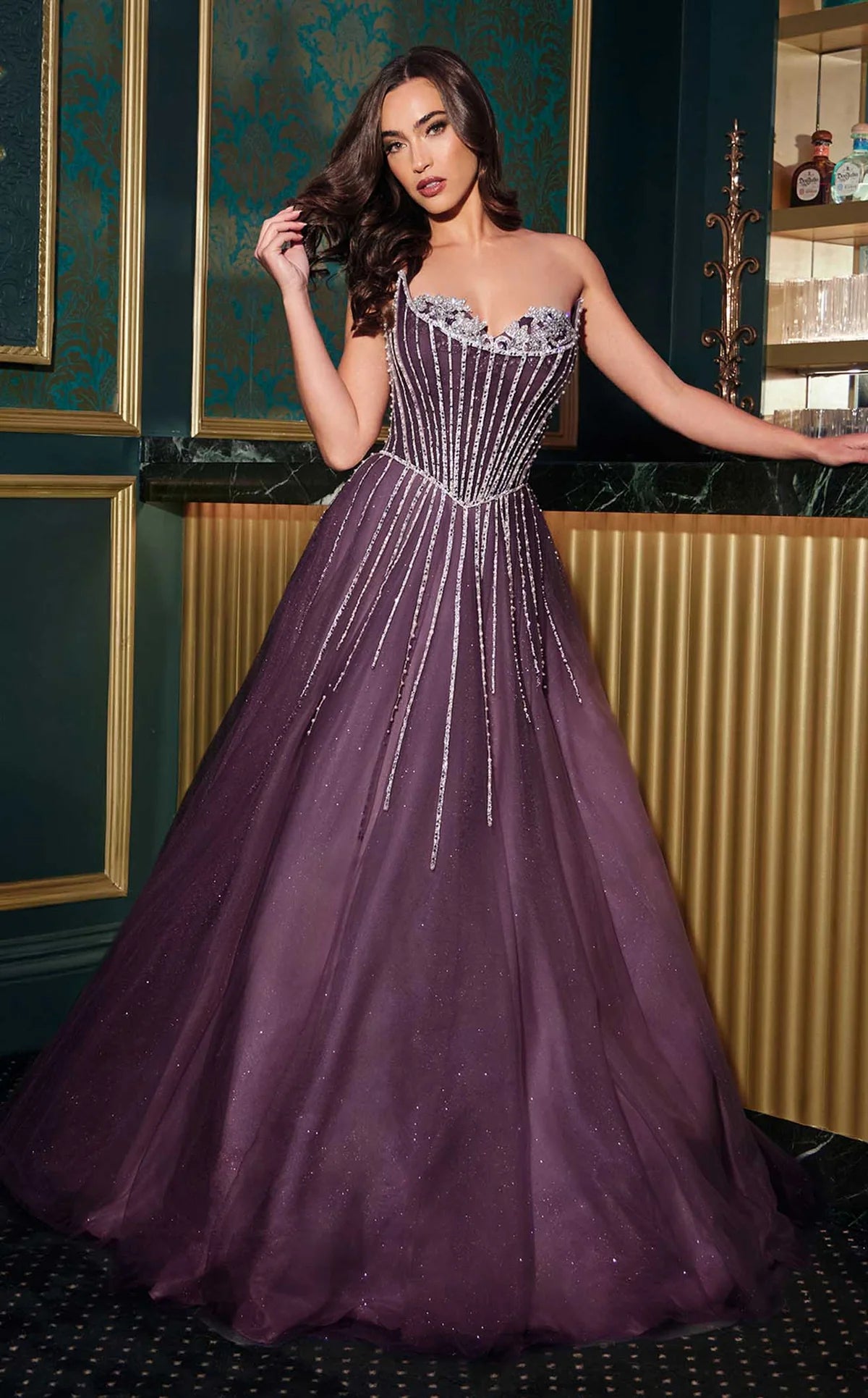 Elevate your formal look with the Ladivine CDS541 Sheer Crystal Corset Dress. Featuring a delicate sheer fabric adorned with shimmering crystals, this dress offers a refined corset silhouette that enhances your figure. The elegant cowl neck adds a sophisticated neckline detail, perfect for prom, pageants, or any grand occasion. Designed for comfort and style, this ballgown combines timeless glamour with modern flair for a standout appearance.&nbsp;

Make a dazzling entrance in this strapless ball gown, feat